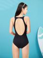 Ladies' Monochrome Twist-front Cutout One-piece Swimsuit