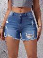 Ripped Raw Hem Denim Shorts