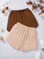 SHEIN Kids SUNSHNE 2pcs/set Teenage Girls' Loose Fit Knitted Solid Color Casual Shorts For Vacation