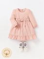 Cozy Cub Baby Girl Ruffle Hem Belted Dress