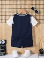 SHEIN Baby Boys' Sports Style Letter & Lion Pattern Patchwork Short Sleeve T-Shirt And Shorts Set