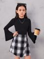 SHEIN Kids FANZEY Tween Girls' Knitted Solid Color Stand Collar Top And Knitted Plaid Skirt Set