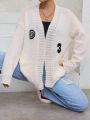 Letter Embroidery Dual Pocket Drop Shoulder Duster Cardigan