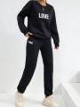 Ladies' 2pcs Letter Pattern Long Sleeve Top And Pants Set