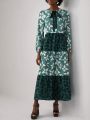 JOY & LIGHT Allover Print Tie Neck Ruffle Hem Smock Dress