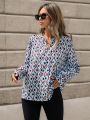 SHEIN Clasi All-Over Printed Notched Neck Long Sleeve Blouse