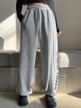 DAZY Text Patterned Drawstring Jogger Pants