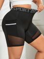 Plus Letter Graphic Mesh Insert Sports Shorts With Phone Pocket