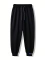 Men Letter Patched Drawstring Waist Pants