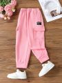 SHEIN Kids EVRYDAY Young Girl Letter Patched Flap Pocket Side Sweatpants