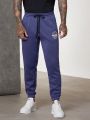 SHEIN Men Letter Graphic Drawstring Waist Sweatpants