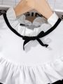 SHEIN Kids Nujoom Young Girl Two Tone Ruffle Trim Bow Front Flounce Sleeve 2 In 1 Blouse