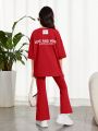 SHEIN Kids EVRYDAY Tween Girls' Casual Comfortable Slogan Printed Round Neck T-Shirt And Flare Pants Set