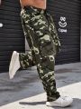 Men Plus Camo Print Flap Pocket Drawstring Waist Cargo Pants