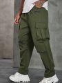 Extended Sizes Men's Plus Size Solid Color Wrinkle-design Zipper & Drawstring Waist Cargo Pants