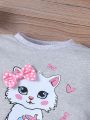 SHEIN Kids QTFun Toddler Girls' Heart Cat & Bow Printed Sweatshirt And Long Pants Set