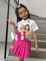 SHEIN Kids Nujoom Young Girls' Portrait Printed Short Sleeve Shirt And Pleated Skirt 2pcs Set