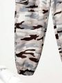 SHEIN Kids SPRTY Boys' Loose Fit Camouflage Woven Jogger Pants