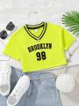 SHEIN Kids EVRYDAY Girls Letter Graphic Striped Trim Crop Tee