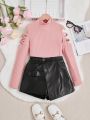 SHEIN Kids FANZEY Girls' Two-piece Set Of Knitted Solid Color Stand-up Collar Fitted Top And Woven Pu Leather Skirt