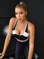 Two Tone Zip Up Crisscross Back Sports Bra