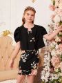 SHEIN Kids FANZEY Tween Girl 1pc Keyhole Neck Puff Sleeve Top & 1pc Floral Print Skirt