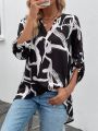 Women's Notched V-neckline Roll-tab Sleeve Printed High Low Hem Casual Shirt