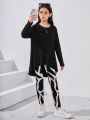 SHEIN Kids Nujoom Tween Girls' Loose Fit Short Front Long Back T-shirt And Leggings Set With Geometrical Pattern Design