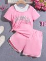 SHEIN Kids SUNSHNE Tween Girls' Letter Print 2-In-1 T-Shirt And Shorts Set