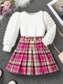 SHEIN Kids FANZEY Little Girls' Solid Color Puff Sleeve Top And Plaid Skirt Set