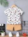 SHEIN Kids QTFun Toddler Boys' Dinosaur Short Sleeve Shirt And Shorts Set