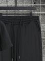 Men's Plus Size Text Pattern T-shirt And Pants Set