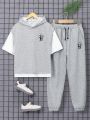 SHEIN Teen Boys' Casual Loose Fit Color-Blocked 2 In 1 Hooded Top With Drawstring And Jogger Pants Two Piece Set