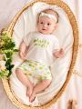 SHEIN Baby Girl Clover Pattern Round Neck Short-Sleeved Top And Casual Shorts Set