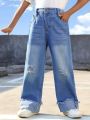 Young Girl Ripped Raw Cut Wide Leg Jeans