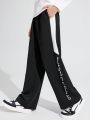 SHEIN Teenage Boys' Casual Loose Fit Side Stripe & Colorblock Patchwork English Print Knitted Straight Leg Pants