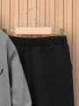 SHEIN Tween Boys' Casual Monogram Pattern Hooded Sweatshirt And Trousers Two-Piece Set