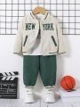 SHEIN Baby Boy Letter Graphic Striped Trim Varsity Jacket & Pants & Tee