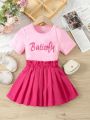 SHEIN Kids EVRYDAY Young Girls' Casual Letter Printed Top And Pleated Skirt 2pcs/Set For Summer