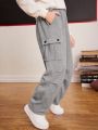 SHEIN Kids EVRYDAY Tween Boy Letter Patched Detail Flap Pocket Side Sweatpants