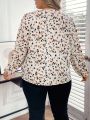 SHEIN LUNE Women's Plus Size Printed V-neck Lace Spliced Lantern Sleeve Shirt With Woven Ribbon