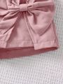 SHEIN Kids Nujoom Young Girls' Solid Color Shorts With Bow Decoration