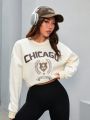 Badge Letter Printed Round Neck Drop Shoulder Sweatshirt