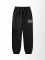 Women's Black Sweatpants With Letter Print And Elastic Cuffs