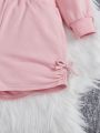 SHEIN Kids EVRYDAY Big Girls' Knitted Solid Color Sweater With Round Collar And Loose Short Style, Plus Knitted Solid Color Shorts With Pleats, 2pcs/set