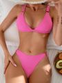 Ladies' Pink Two-Piece Swimsuit With Circular Ring Decoration