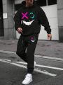 Extended Sizes Men's Plus Size Cartoon Smiling Face Printed Hoodie With Drawstring And Sweatpants Set