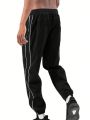 Men Letter Graphic Contrast Piping Drawstring Waist Pants