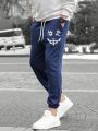 Manfinity EMRG Men Cartoon Graphic Drawstring Waist Sweatpants