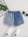 SHEIN Young Girl's New Blue Denim Shorts With Distressed Details And Color Block Design